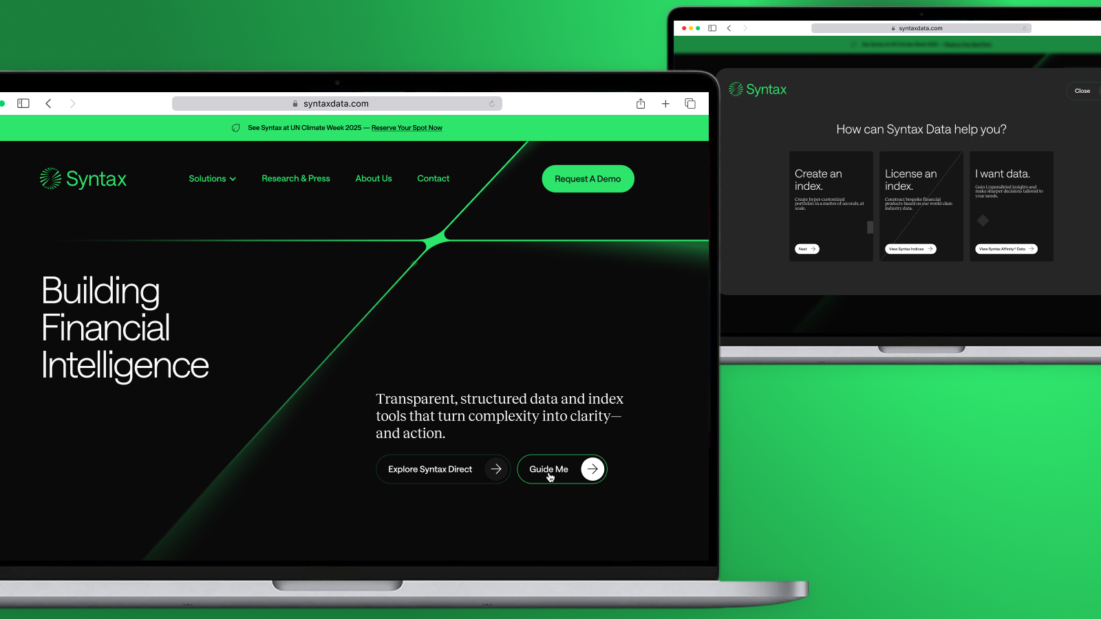 SyntaxData homepage showing Building Financial Intelligence messaging with Guide Me modal